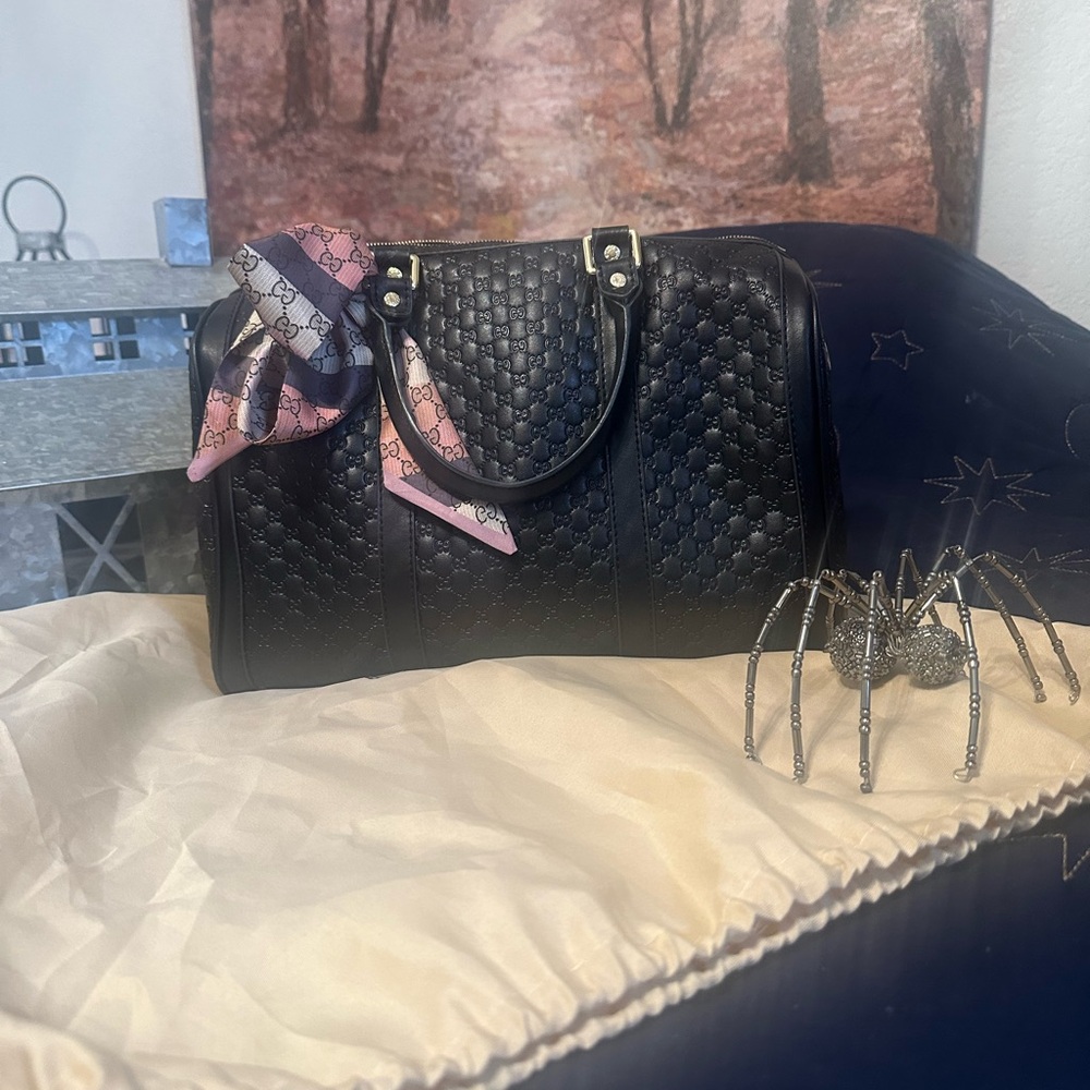 Elegant Black Quilted Satchel with Pink Accent Scarf